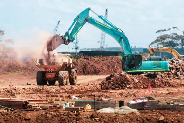 Dusty, noisy construction work - Photo by Troy Mortier on Unsplash